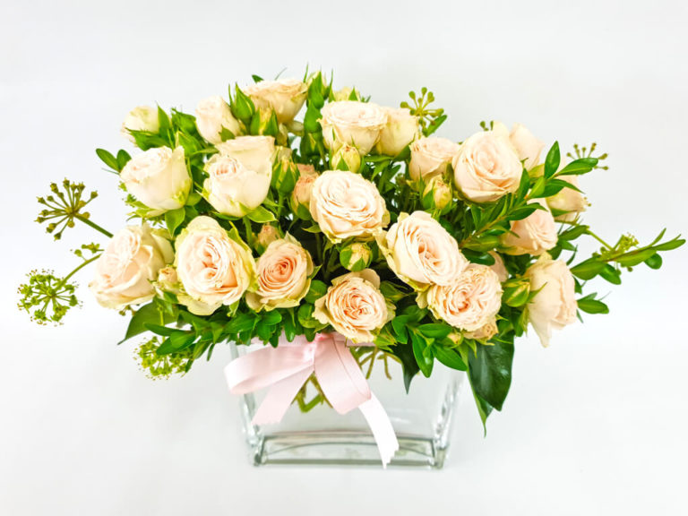 1576643666 spray rose in glass vase 1 1024px 768x576