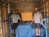 boz n kelly in back of truck
