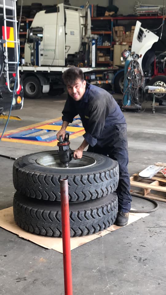 man with tyres