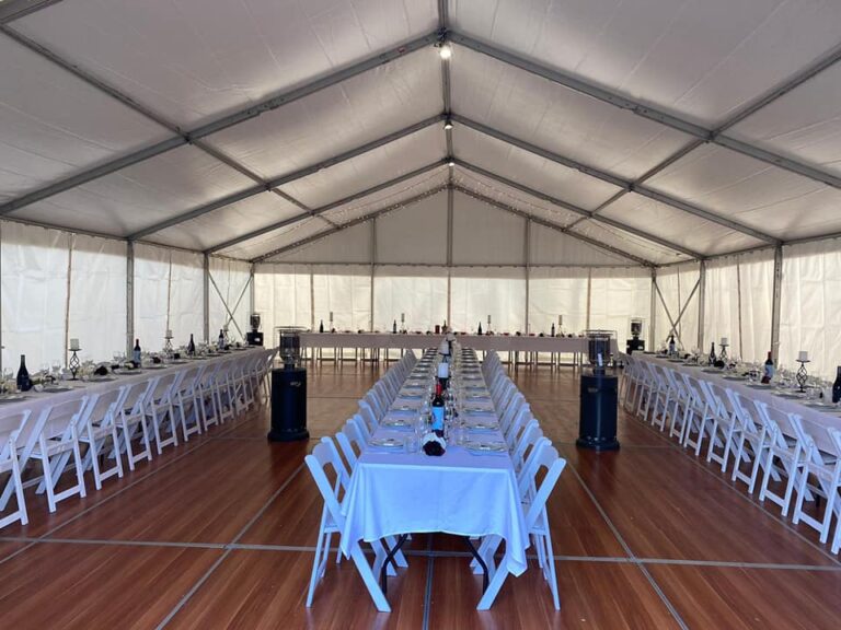 white structured marquee with gladiator chairs 768x576