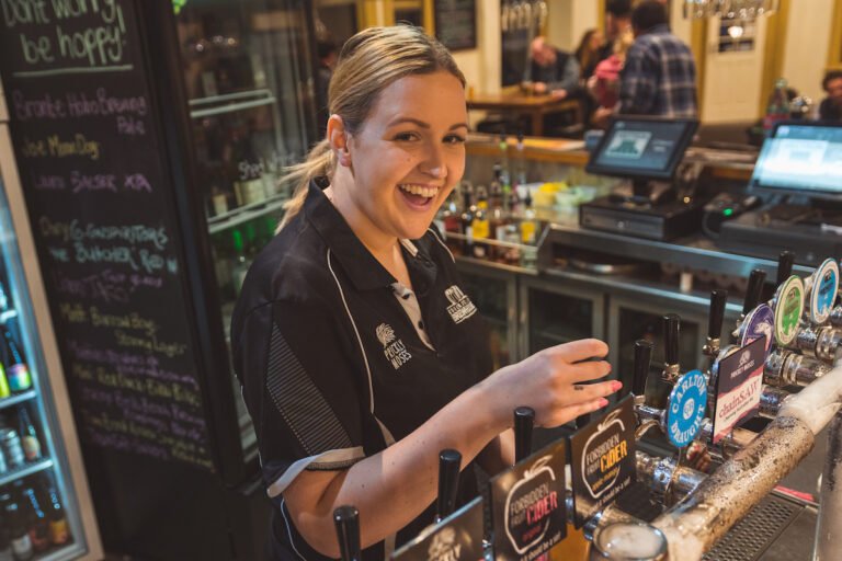 bar staff smile 768x512