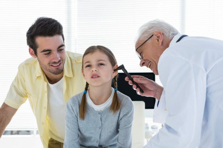 doctor examining the ear of patient SVLRGYJ 1024x683 1 768x512