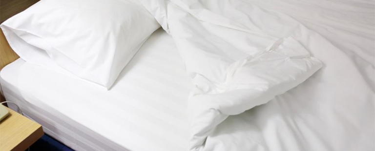 Duvet protector on bed 768x310