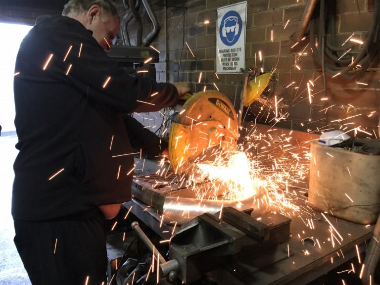 Grinding a truck exhaust 768x576