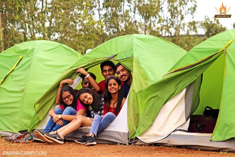 Pawna lake camping i people sitting in tent 768x512