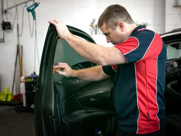 North Lakes professional window tinter installing car window tint 768x576