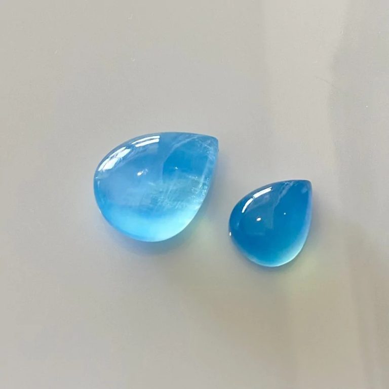 aquamarine smooth pear shape cabochon parcel 159583 1 768x768