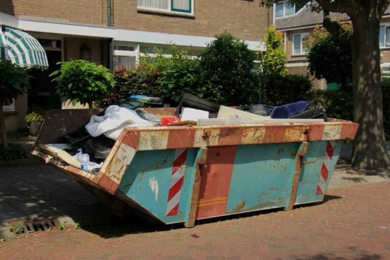 Loaded dumpster near a construction site home renovation 1 768x512